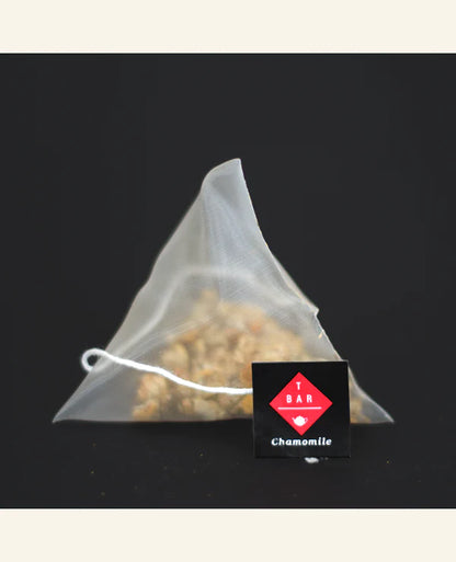Kasa Coffee Chamomile Pyramid Tea - Organic chamomile tea in silken pyramid bags, offering a gentle and aromatic brew perfect for winding down